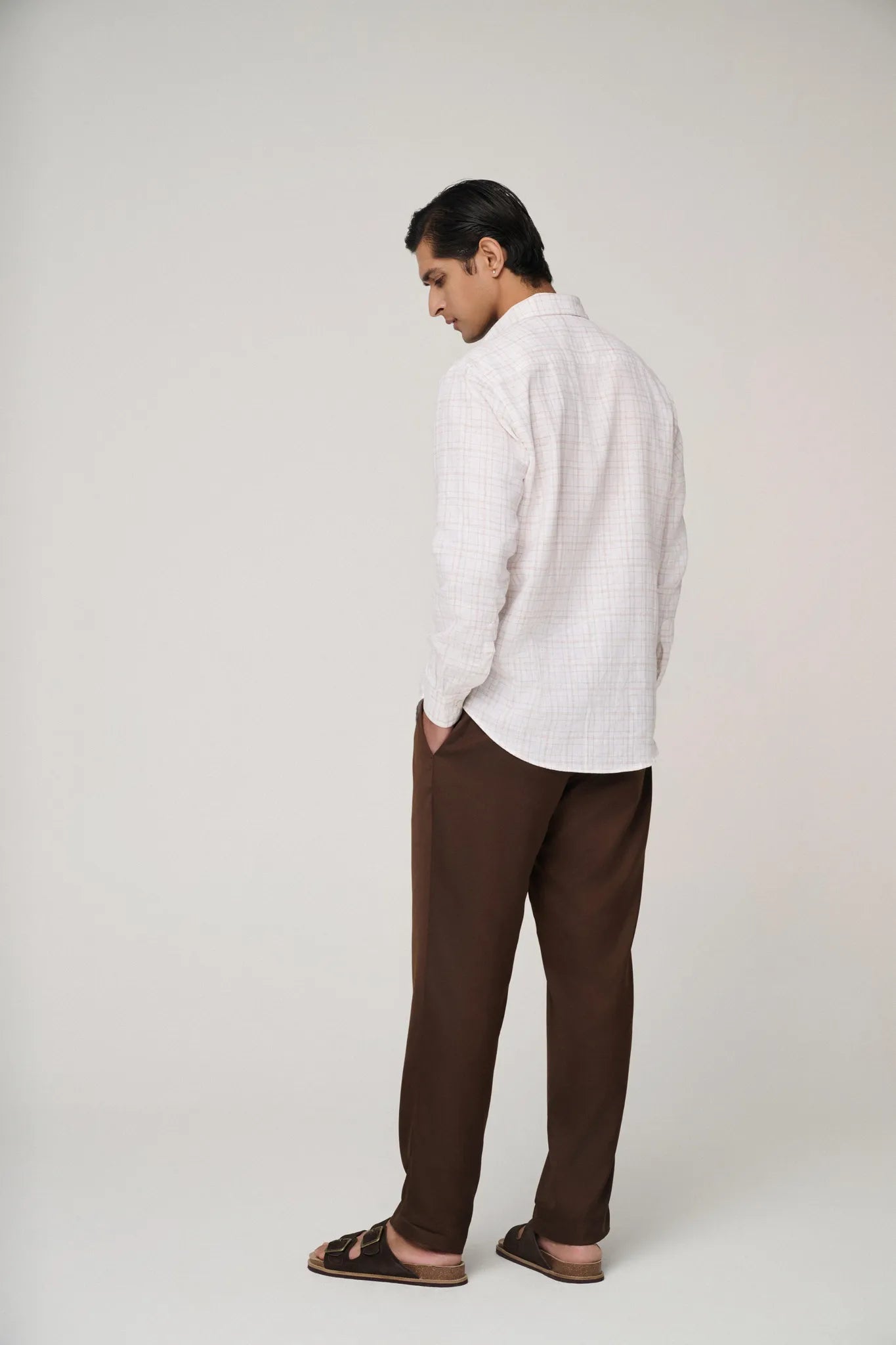 Back view of pink check linen shirt.