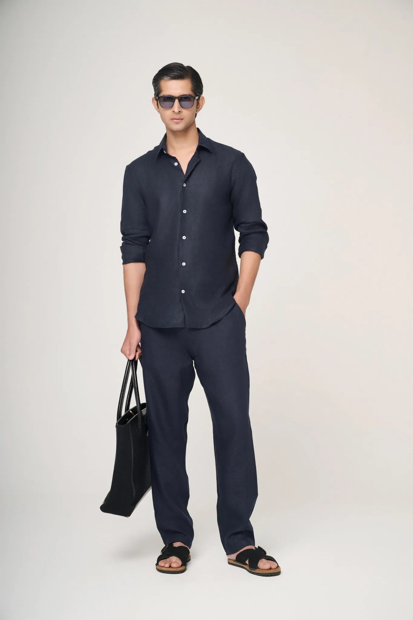 navy blue linen shirt styled for evening wear