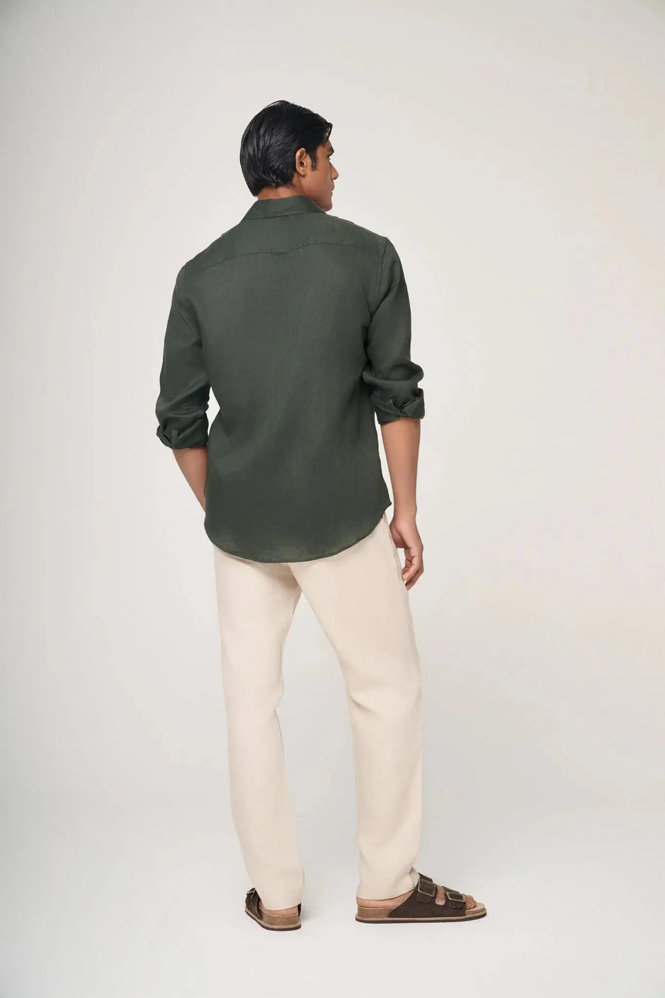 green linen shirt back view with natural flow