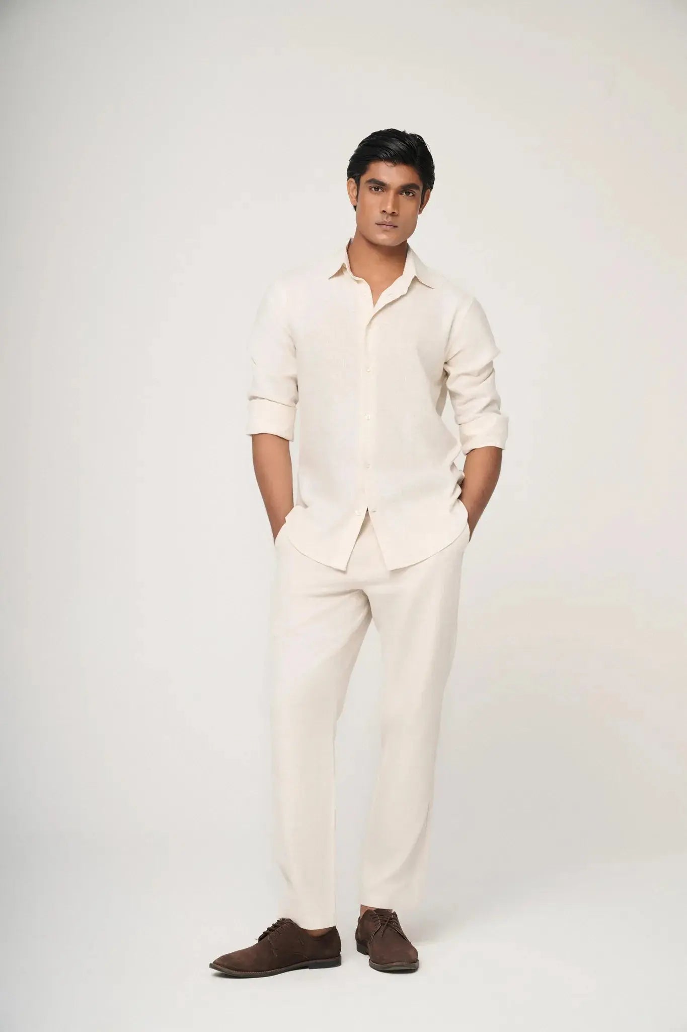 cream linen shirt styled for elegant casual look