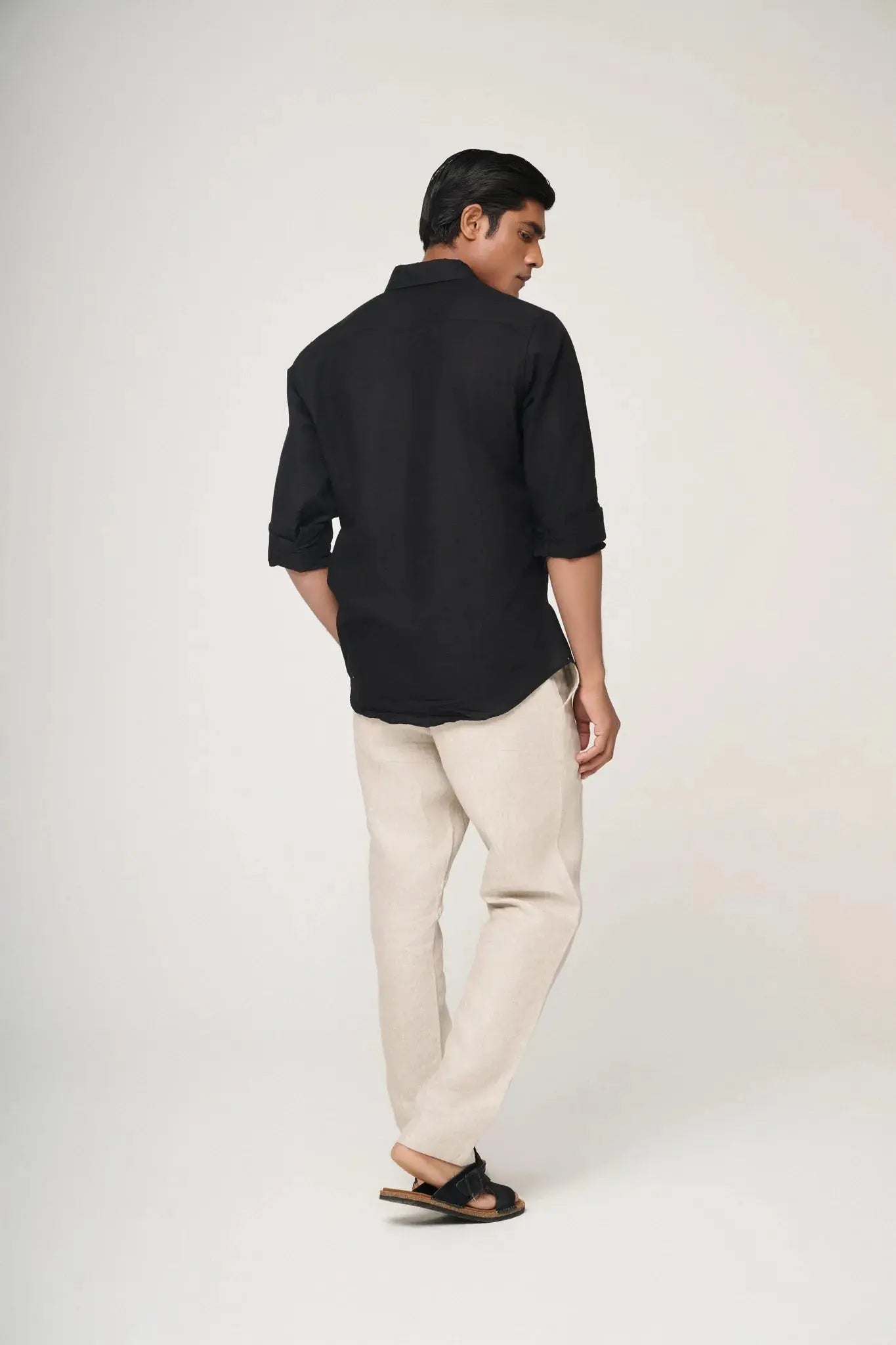 black linen shirt back view showing relaxed silhouette