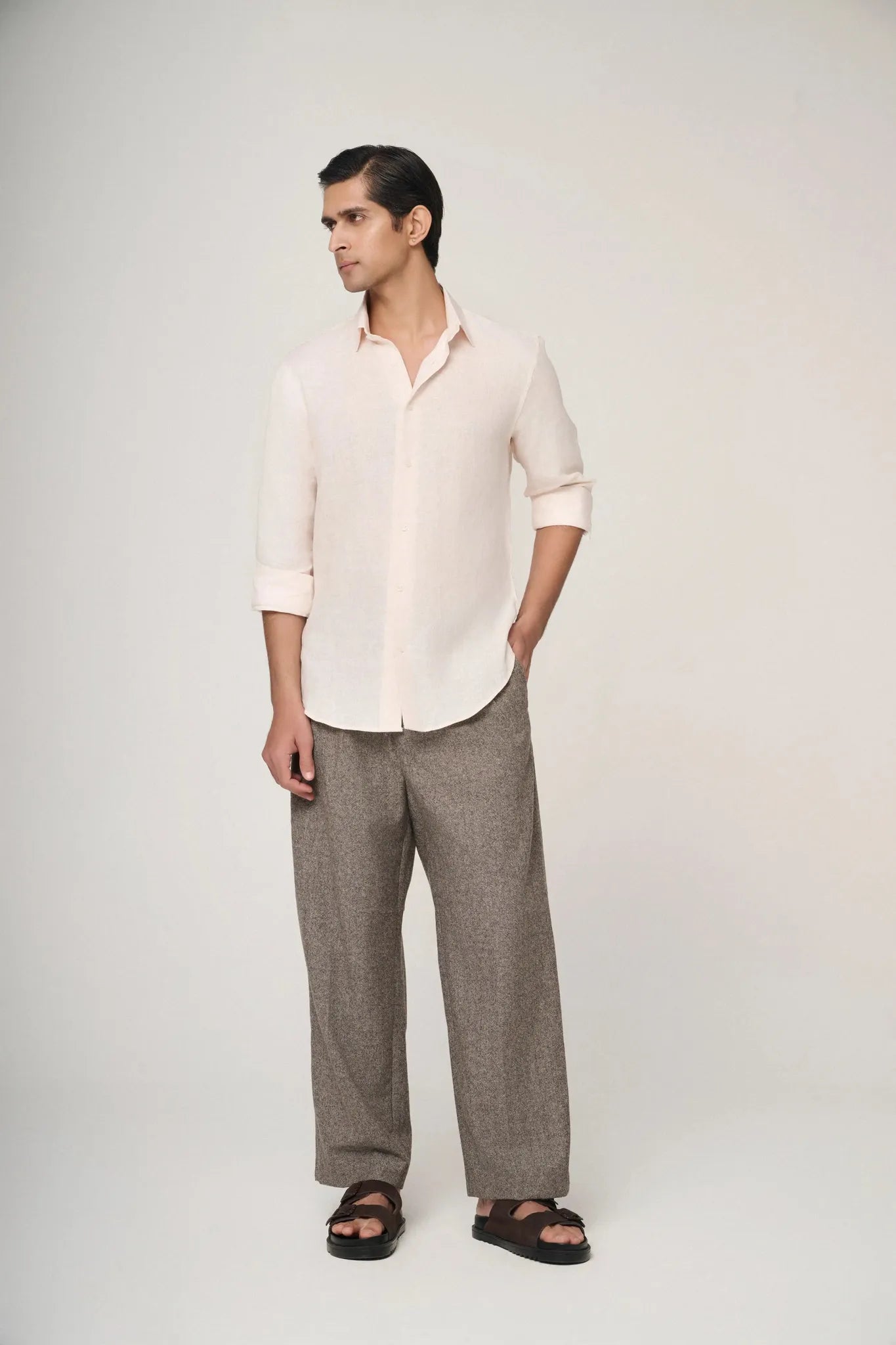 peach linen shirt styled for casual elegance