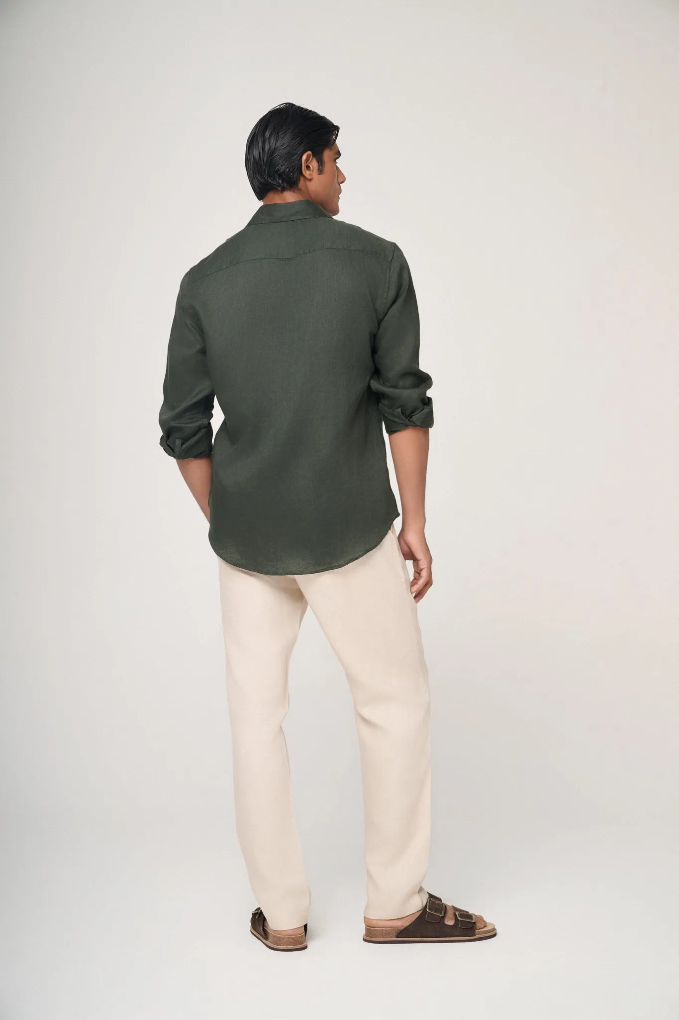 green linen shirt back view with natural flow