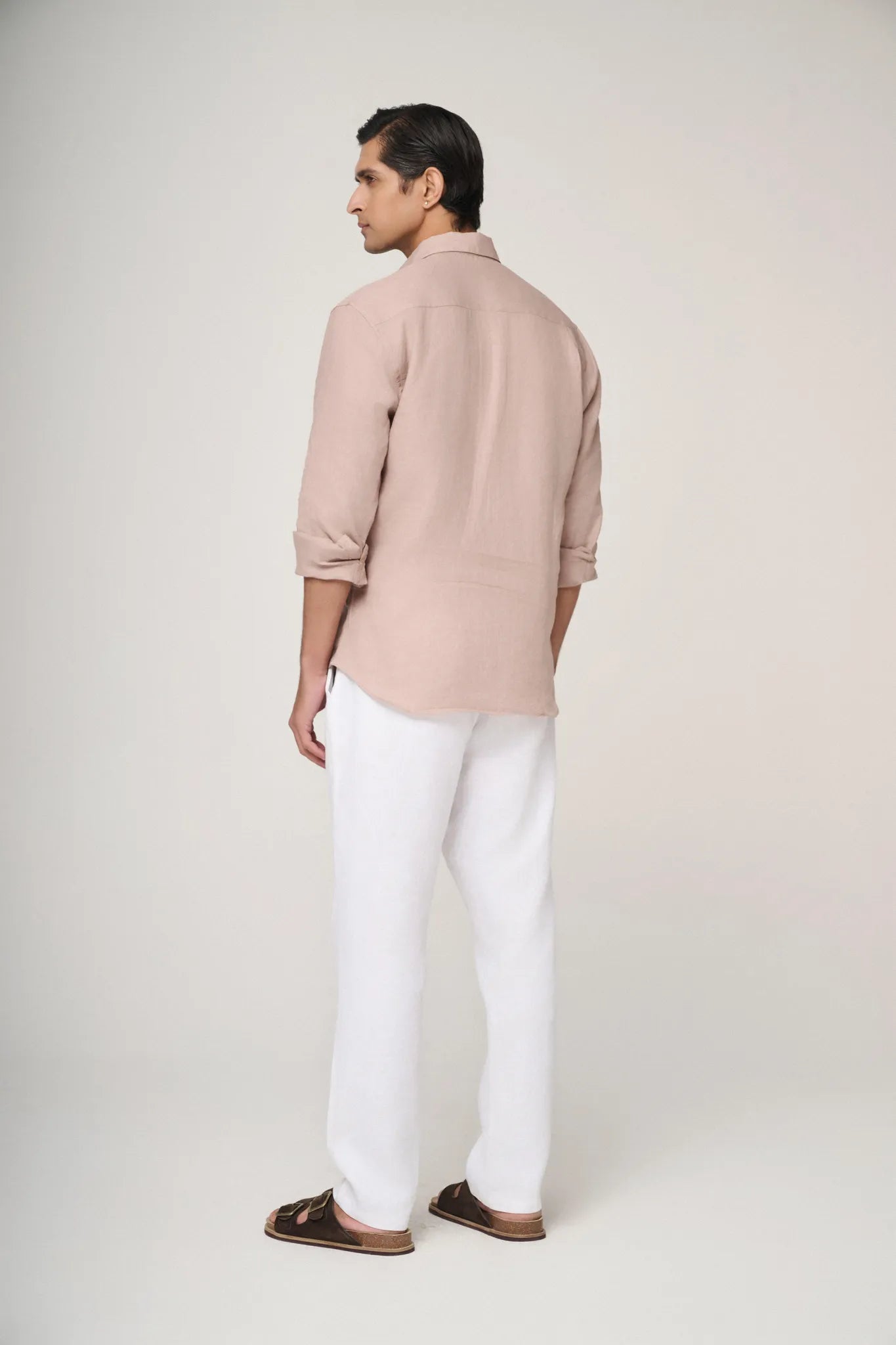 back view of camel linen shirt showing relaxed fit
