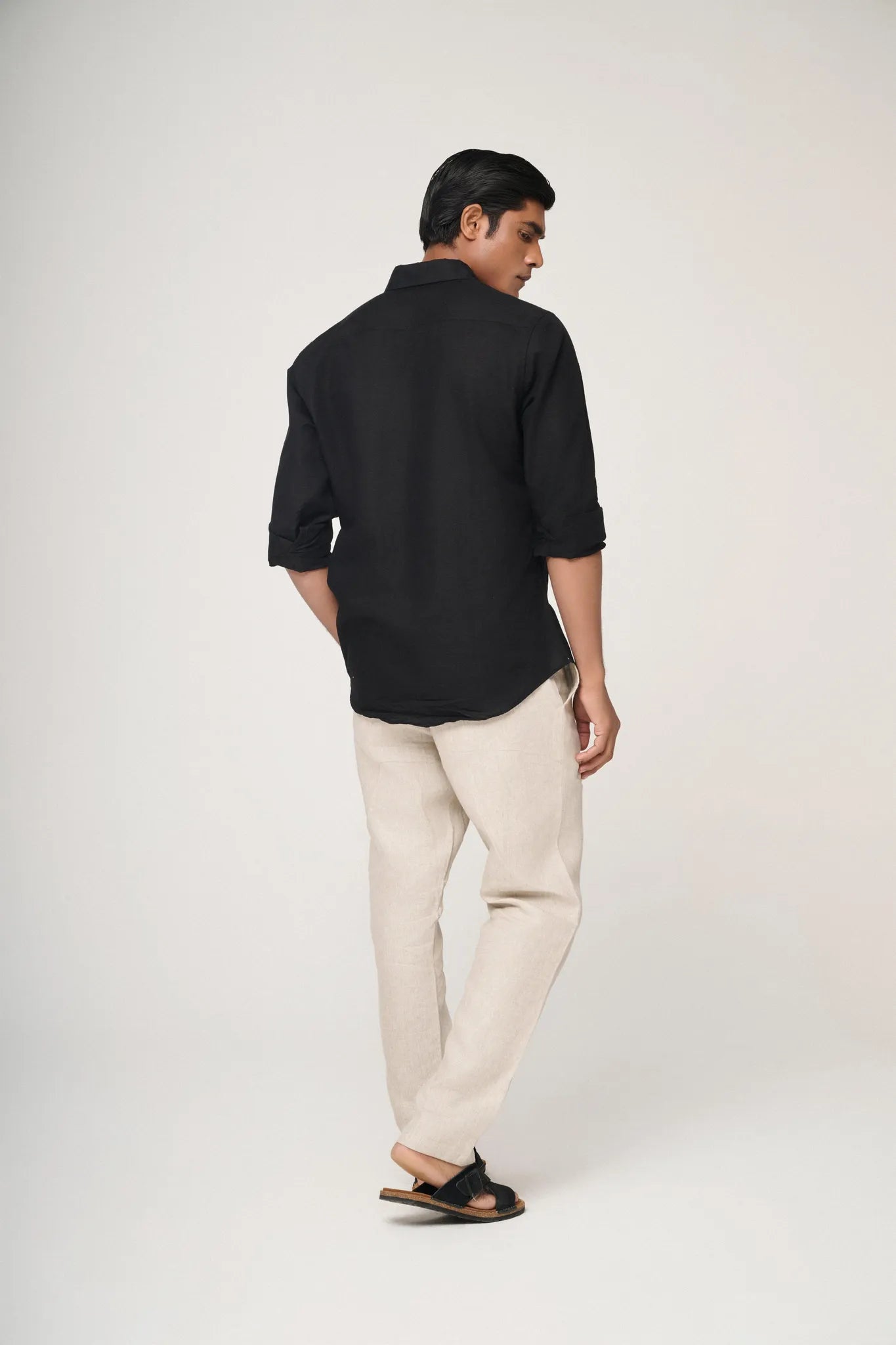 black linen shirt back view showing relaxed silhouette