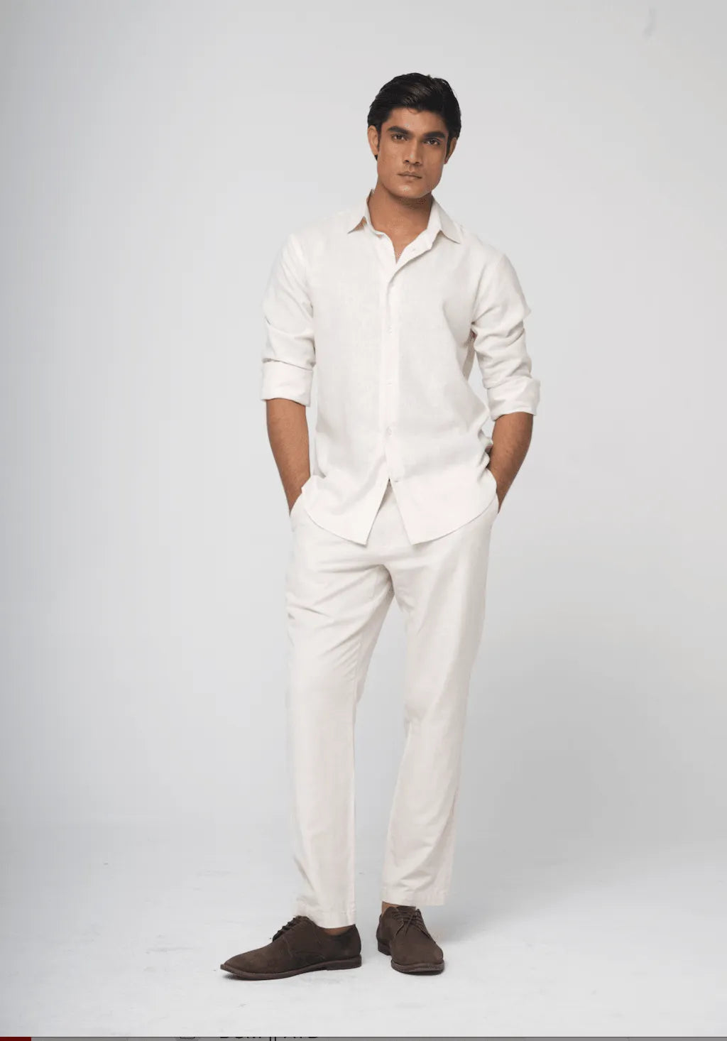 cream linen shirts paired with pants.